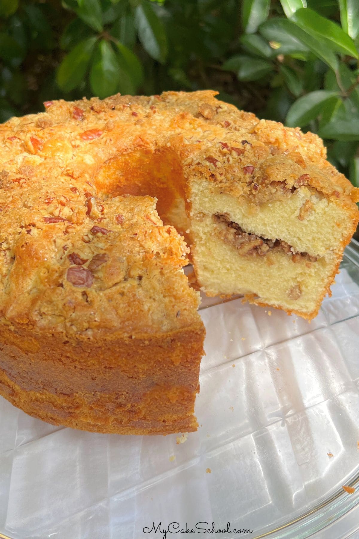 Coffee Cake pound cake, sliced, on a pedestal.