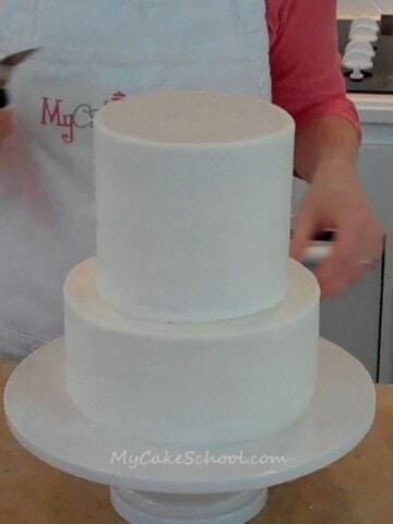 Learn the Basics of Tier Stacking in this Member Cake Video Tutorial from MyCakeSchool.com!