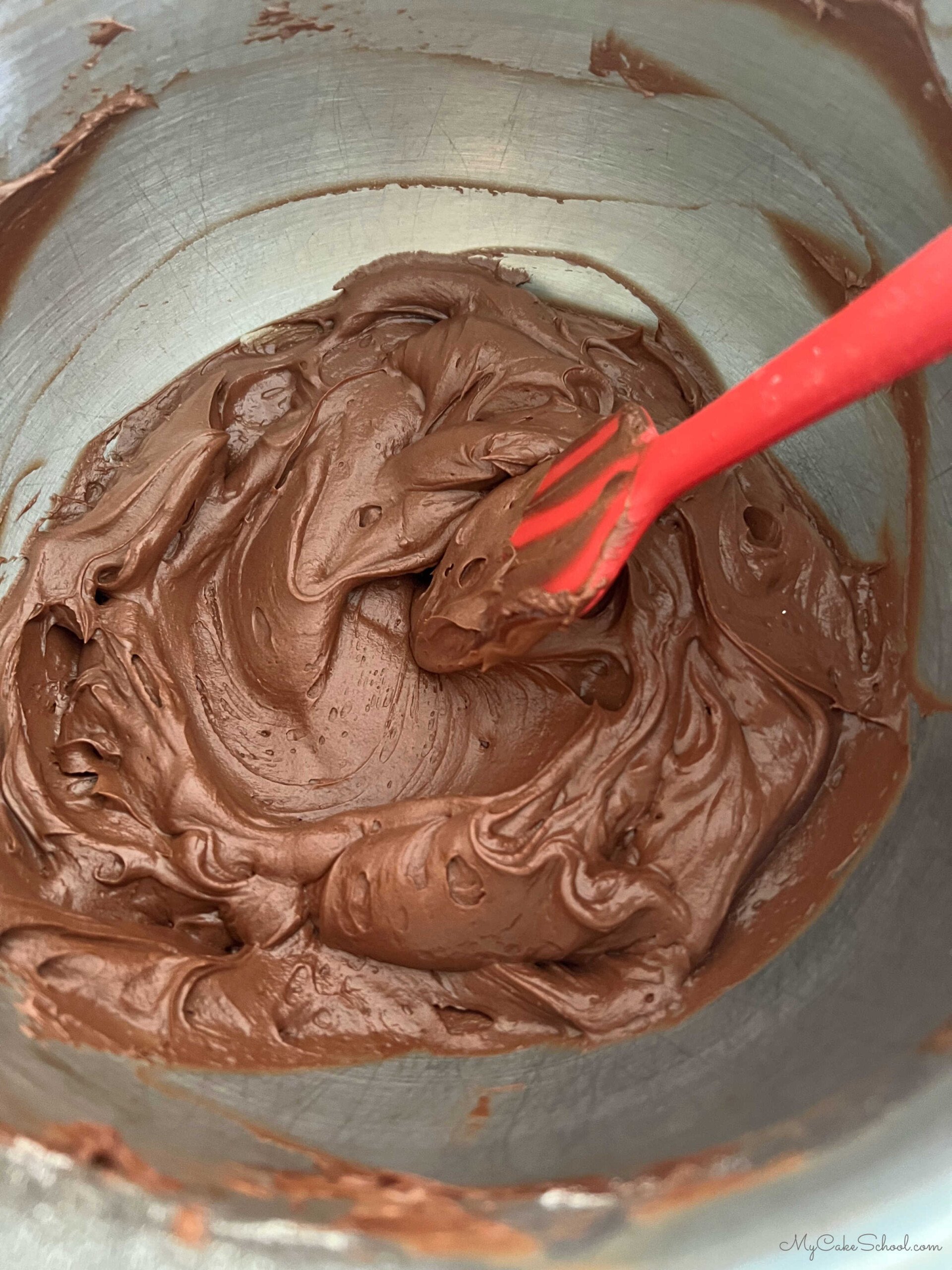 Chocolate Buttercream Frosting in mixing bowl.
