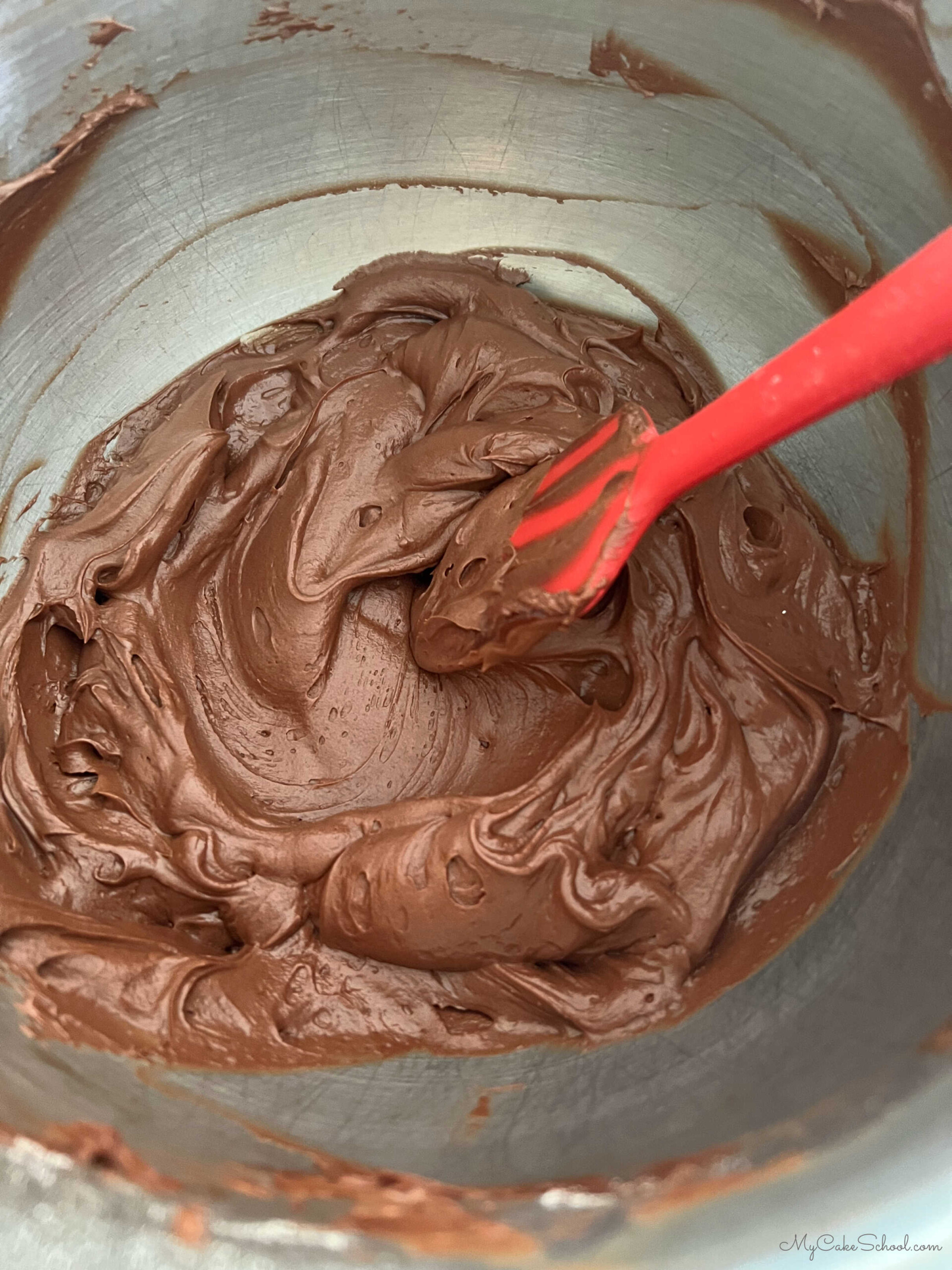 Chocolate Buttercream Frosting in mixing bowl.