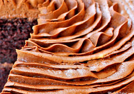 Amazing Classic Chocolate Buttercream Frosting Recipe by MyCakeSchool.com. This easy recipe tastes fantastic, works as a great filling and frosting for cakes and cupcakes, and pipes beautifully! MyCakeSchool.com online cake tutorials, videos, recipes, and more!