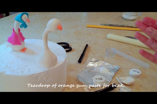 Learn how to make a Mother Goose Cake Topper in this MyCakeSchool.com free cake decorating tutorial!
