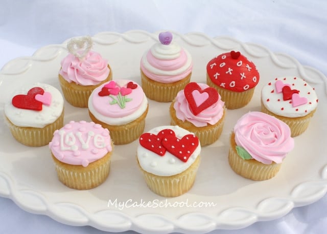 Adorable Valentine's Day Cupcake Tutorial! Choose from a variety of simple cupcake designs, and also learn how to create buttercream with a smooth finish using the Viva Paper Towel Method of smoothing!