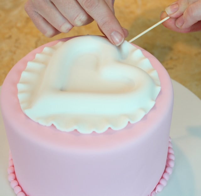 Beautiful Raised Heart Cake Tutorial! Perfect for Valentine's Day! Free tutorial by MyCakeSchool.com.