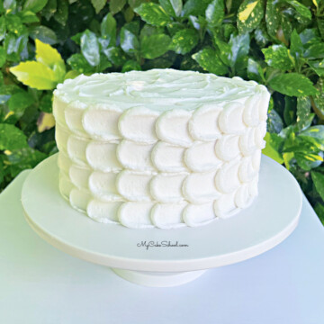 petal cake on pedestal