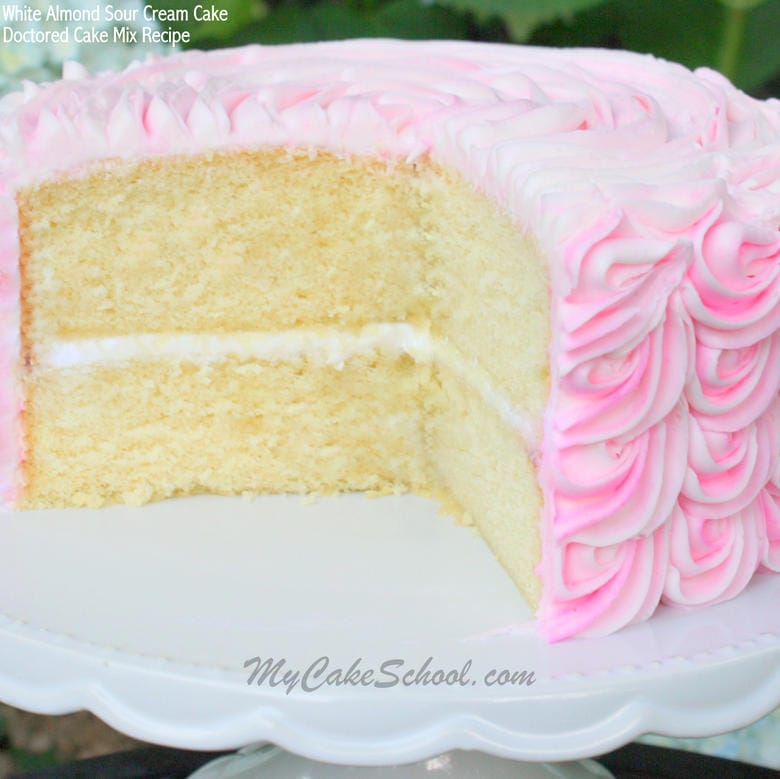 Delicious and Simple White Almond Sour Cream Cake (Doctored Cake Mix) Recipe! So moist and delicious! MyCakeSchool.com.