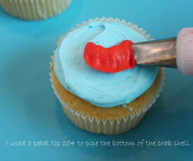 Adorable Beach Cupcakes featuring colorful fish and crabs! The perfect cupcakes for pool parties and beach parties! Free tutorial by My Cake School.