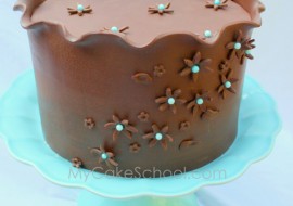 Learn to create a Beautiful Modeling Chocolate Wrap! MyCakeSchool.com Member-Cake-Tutorial. MyCakeSchool.com Online Cake Tutorials, Videos, & Recipes!!