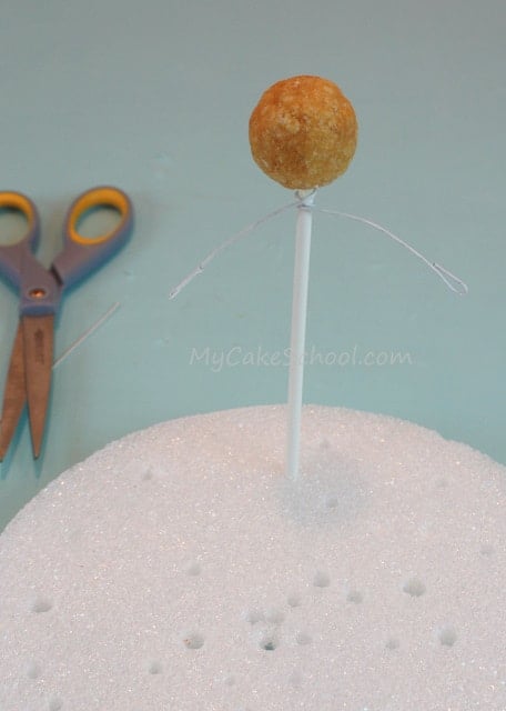 Learn to make a CUTE Ghost Cake Topper in this free step by step cake decorating tutorial by MyCakeSchool.com! PERFECT for Halloween!