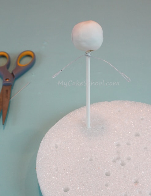 Learn how to make a ghost cake topper in this free Halloween Cake Tutorial by MyCakeSchool.com!
