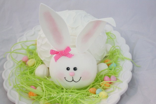 Adorable Bunny Cake Tutorial by My Cake School! Free step by step cake decorating tutorial. MyCakeSchool.com Online Cake Tutorials, Cake Videos, Cake Recipes, and more!