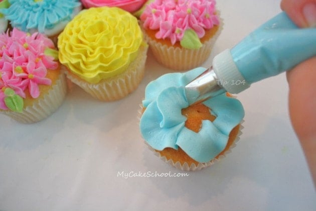 Beautiful Pull Apart Cupcake Cake Bouquet! Learn how to make this, as well as simple buttercream piping techniques in this Free tutorial by MyCakeSchool.com.