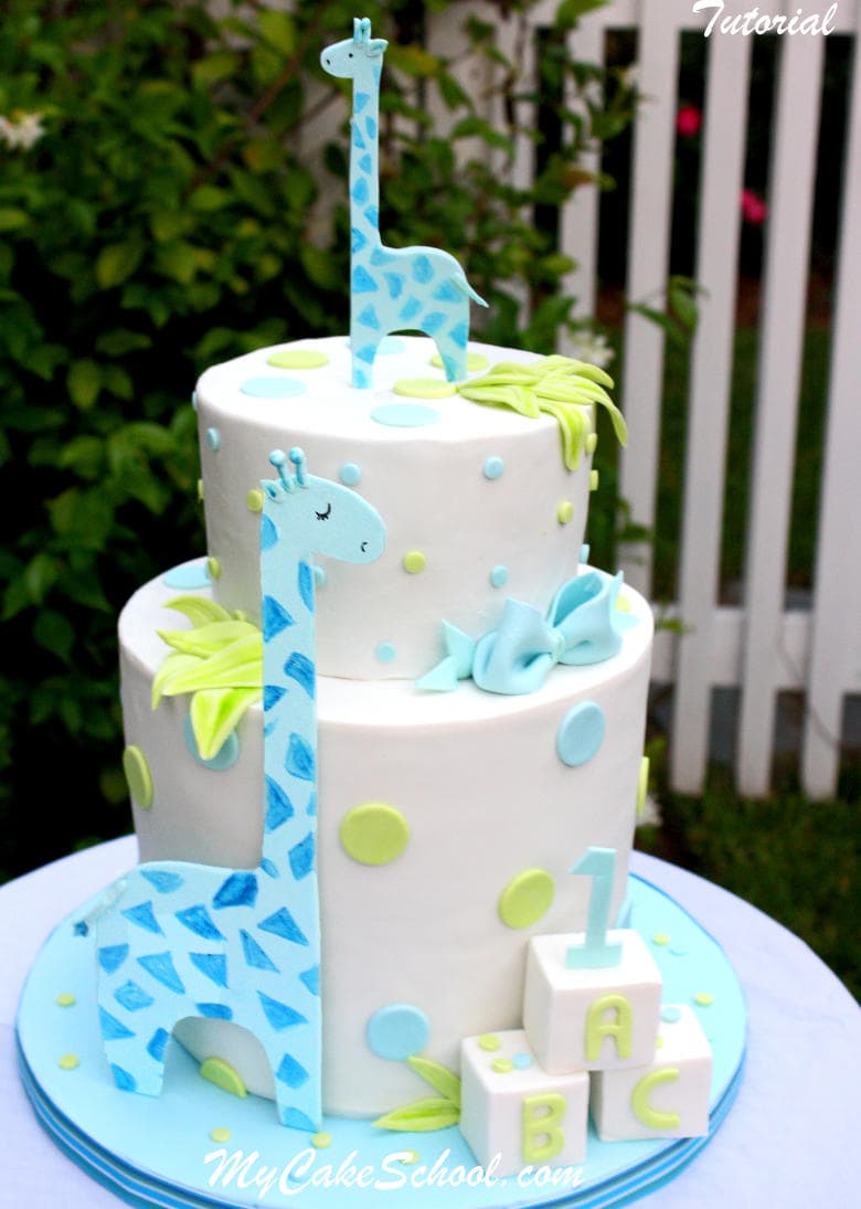 Learn how to make a double barrel cake and sweet giraffes in this MyCakeSchool.com video! Perfect for young birthdays and baby showers! MyCakeSchool.com.