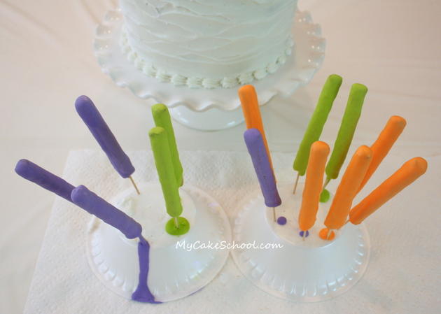 Free Tutorial for a CUTE Halloween Party Cake featuring witch legs and brooms! So fun and festive! MyCakeSchool.com 