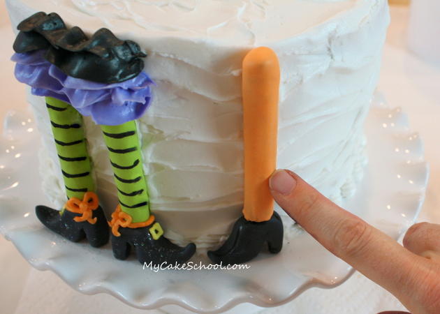 Free Tutorial for a CUTE Halloween Party Cake featuring witch legs and brooms! So fun and festive! MyCakeSchool.com 