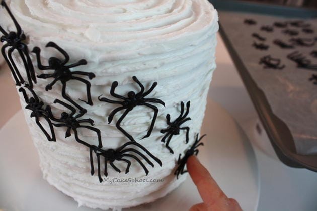 Learn how to make creepy chocolate spiders for your Halloween cakes and cupcakes in this free step by step cake tutorial by MyCakeSchool.com!