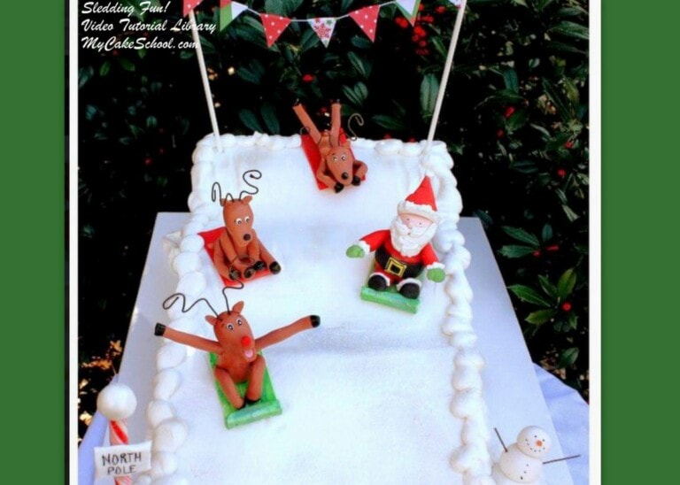 Sledding into Christmas! Learn to make Santa and reindeer toppers as well as a sledding scene in this My Cake School video tutorial!