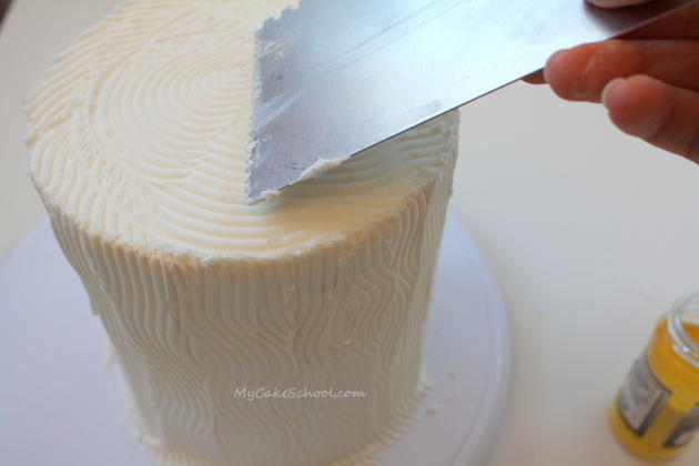 Creating Beautifully Combed Buttercream! From our Bouquet of Billy Balls Cake Tutorial on MyCakeSchool.com!