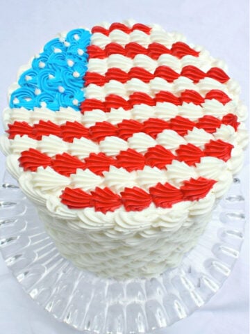 July Fourth Cake with Buttercream Flag on top, piped with buttercream shells.