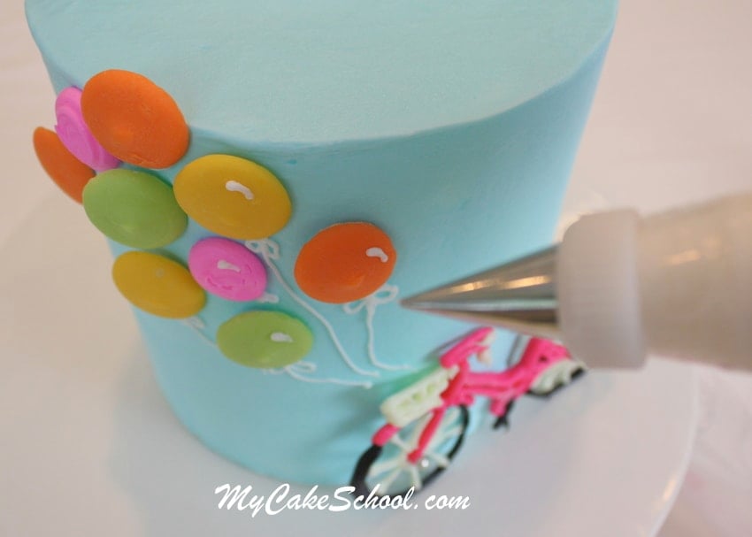 Adorable Bicycle and Balloons Cake! Free cake decorating tutorial by MyCakeSchool.com! Online cake classes & recipes!