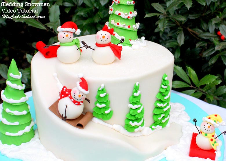 Sledding Snowman Cake! An adorable cake design for Christmas or winter. Tutorial by MyCakeSchool.com!