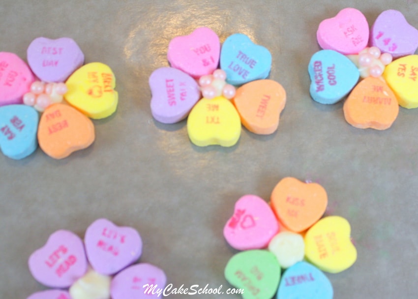 Learn how to make CUTE Conversation Heart Flowers for Cupcakes! Free Cupcake Tutorial for Valentine's Day! MyCakeSchool.com.