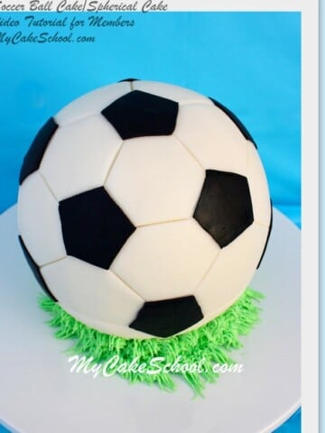 3D soccer ball cake on a pedestal