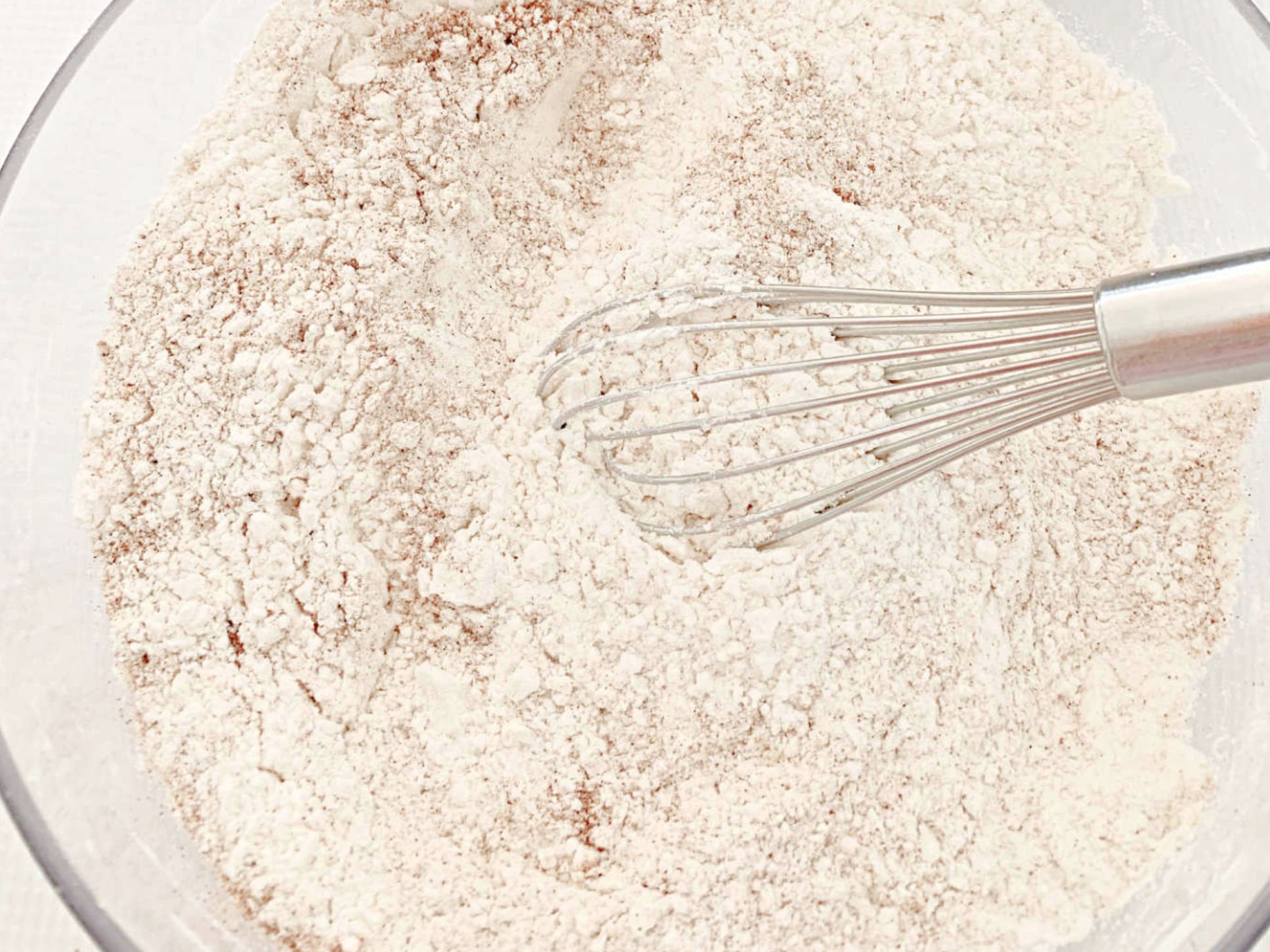 Bowl of Dry Ingredients with Whisk.