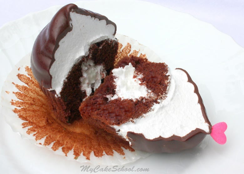 Delicious Hi hat Cupcake featuring fluffy white frosting and a delicious chocolate shell! Free tutorial by MyCakeSchool.com.