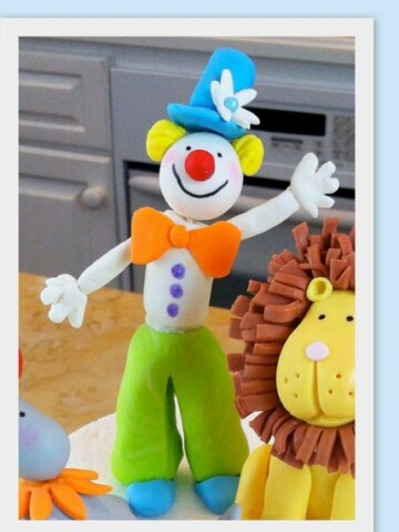 How to Make a Gum Paste Clown Cake Topper in this MyCakeSchool.com video tutorial.