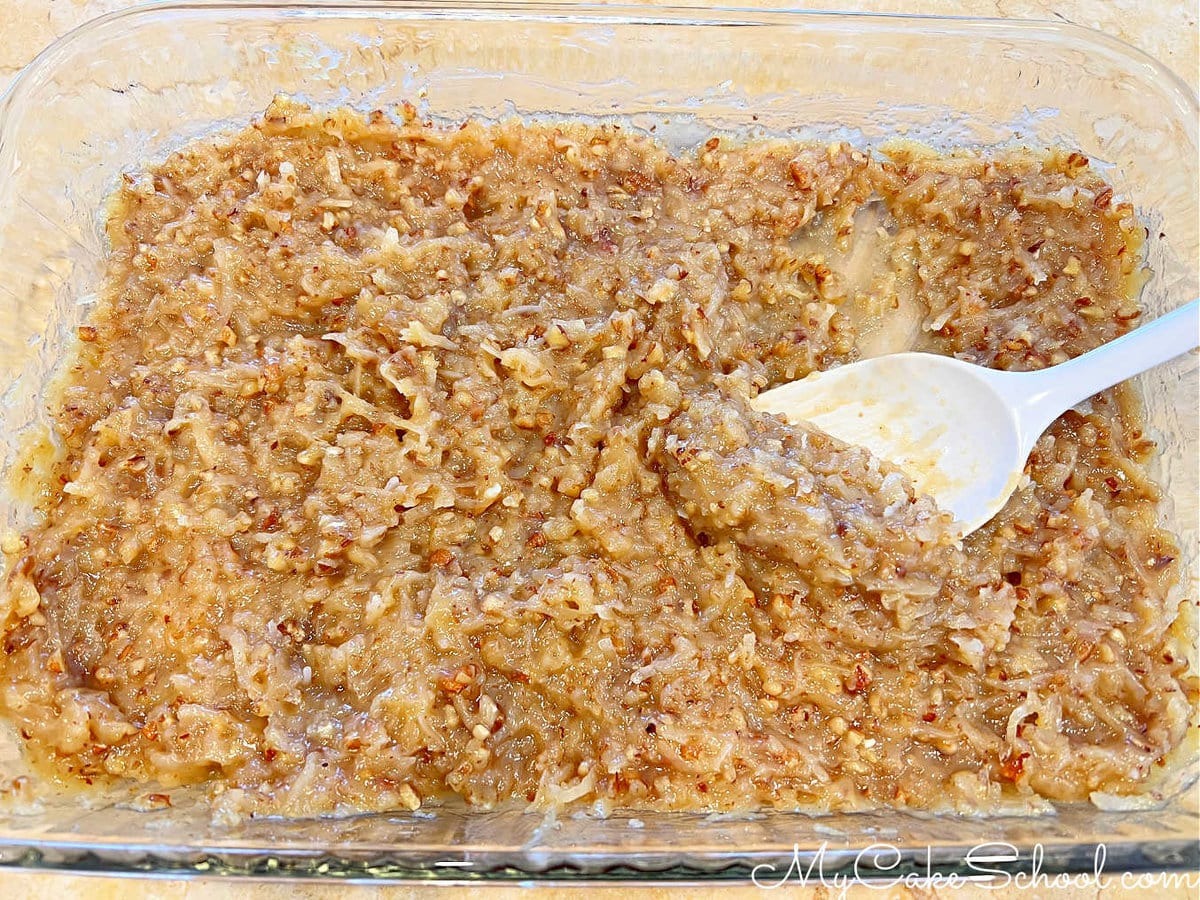 Coconut Pecan Filling, cooling in a casserole dish.