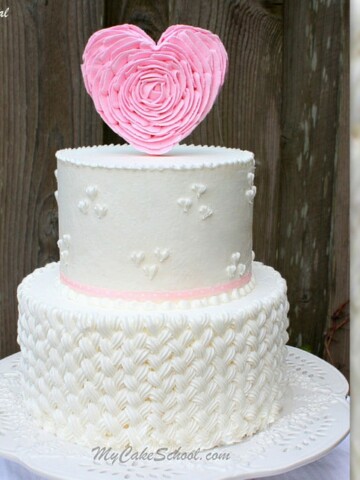 How to Pipe Braided Buttercream & Ruffled Heart Cake Topper! A My Cake School video tutorial.