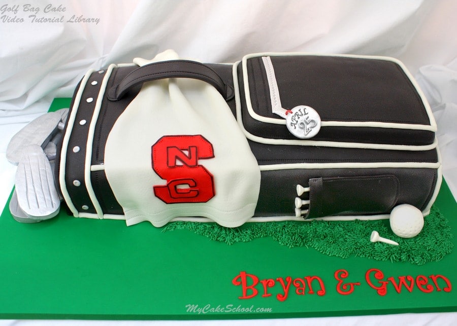 Black fondant golf bag cake with small NC State fondant towel