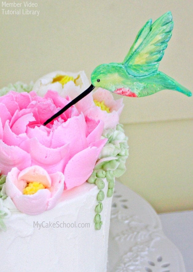 Hummingbird Cake Topper Tutorial with Fluffy Frosting Flowers! by MyCakeSchool.com