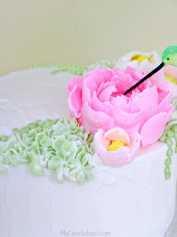 Beautiful Hummingbird Cake Topper Tutorial with Large Frosting Flowers! Video Tutorial by MyCakeSchool.com!