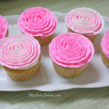 Learn how to pipe gorgeous buttercream ribbon roses onto cupcakes in this free MyCakeSchool.com cake decorating video tutorial! Perfect for all skill levels!