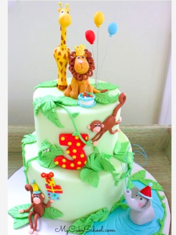 Jungle Cake with fondant lion and giraffe cake topper.