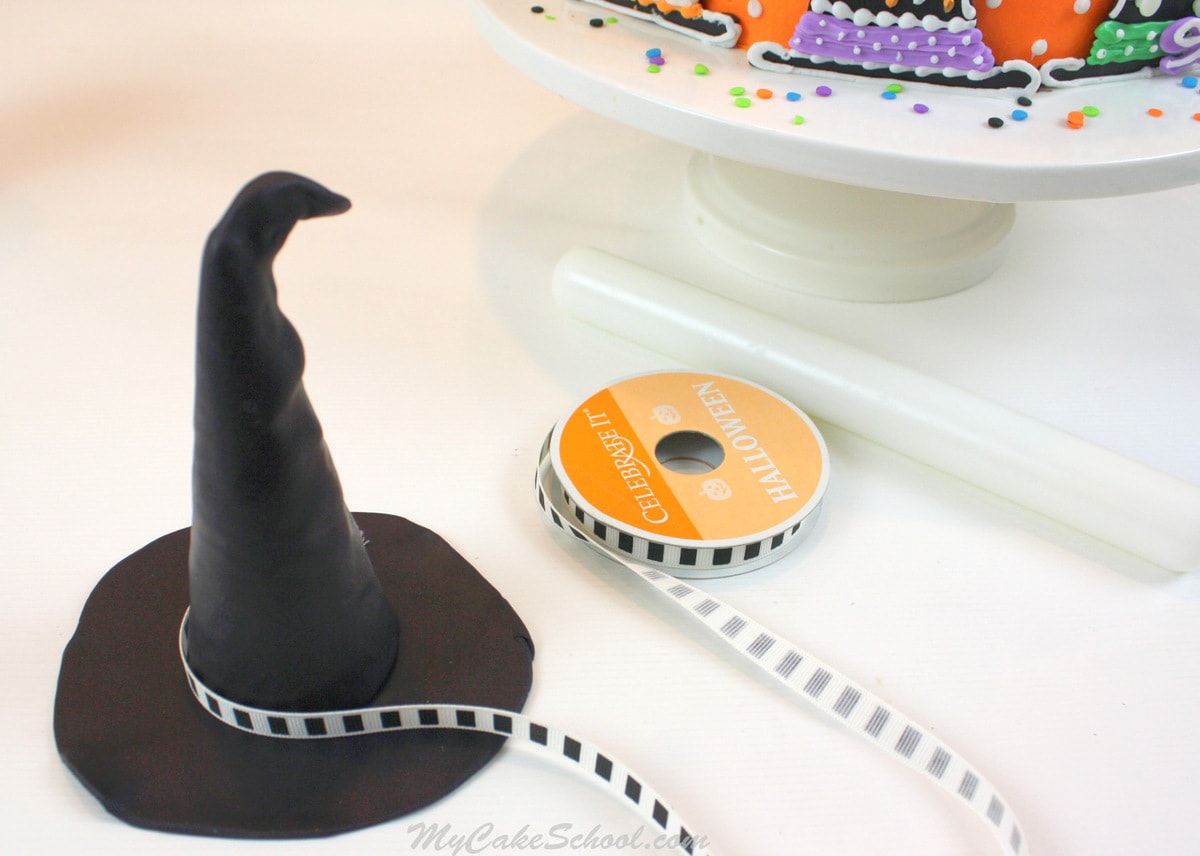 Learn to make a witch hat cake topper and witch hat cake decorations in this free MyCakeSchool.com cake tutorial!