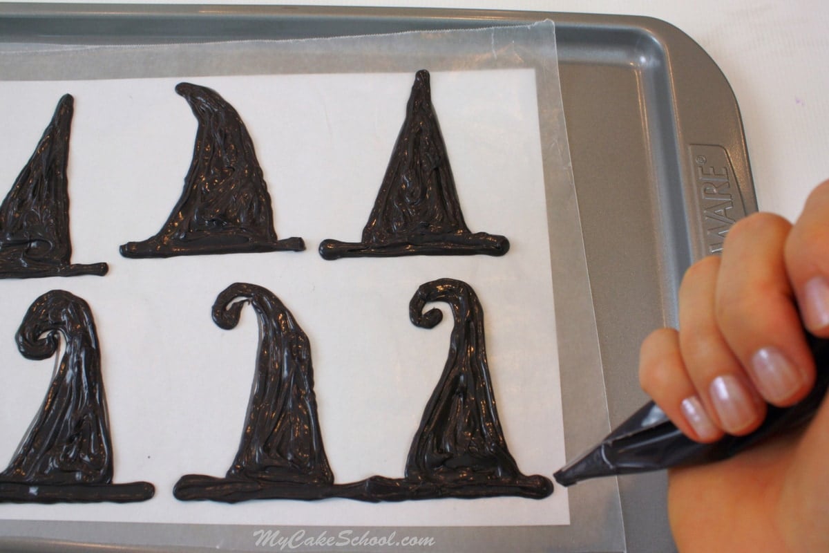 Adorable Halloween Cake Tutorial by MyCakeSchool.com featuring witch hats! So fun and festive! Witch Hats!- A Halloween Blog tutorial by MyCakeSchool.com!
