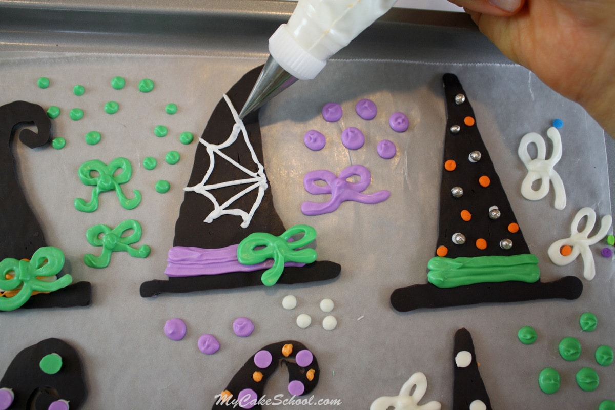 FUN Halloween Cake Decorating Video Tutorial by MyCakeSchool.com! This festive Halloween cake features witch hats! Witch Hats!- A Halloween Blog tutorial by MyCakeSchool.com!