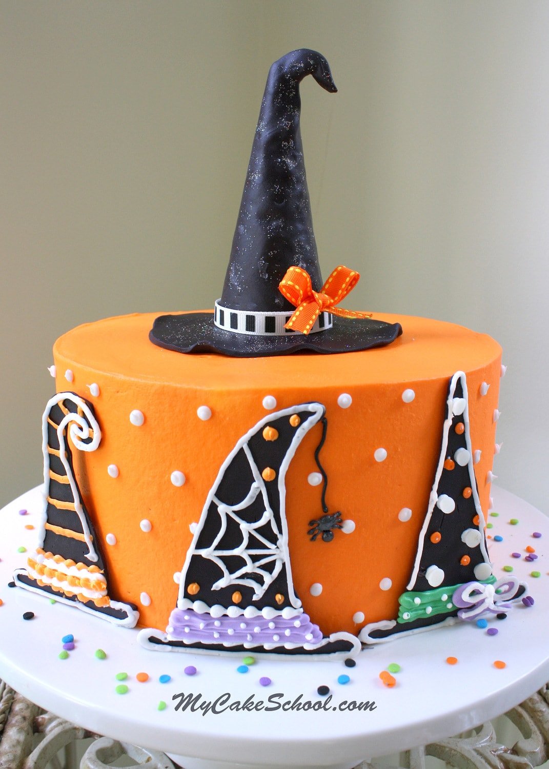 Learn how to make a Witch Hat themed cake in this CUTE and free cake tutorial by MyCakeSchool.com! PERFECT for Halloween Parties!