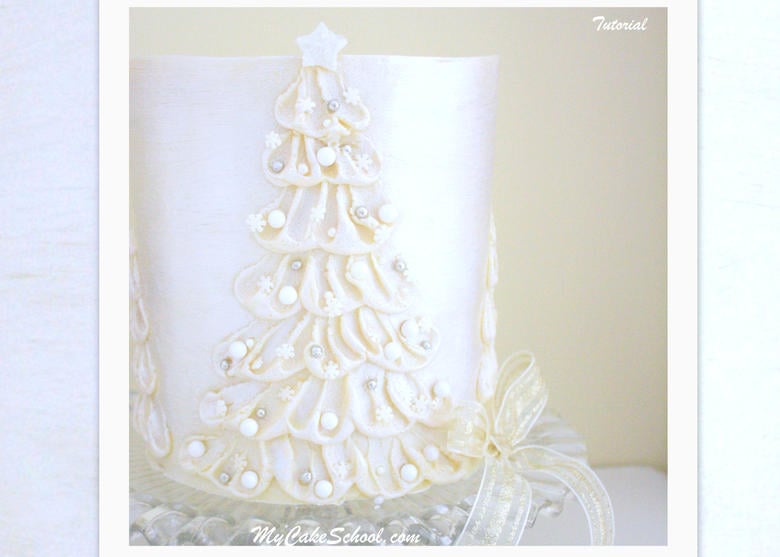 Learn to make a gorgeous White Chocolate Ganache Christmas Tree Cake! A cake decorating video tutorial by MyCakeSchool.com!