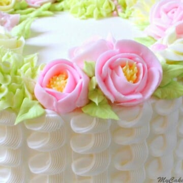 Learn how to make a gorgeous buttercream floral wreath cake in this MyCakeSchool.com cake video tutorial! MyCakeSchool.com online cake tutorials, videos, recipes, and more!