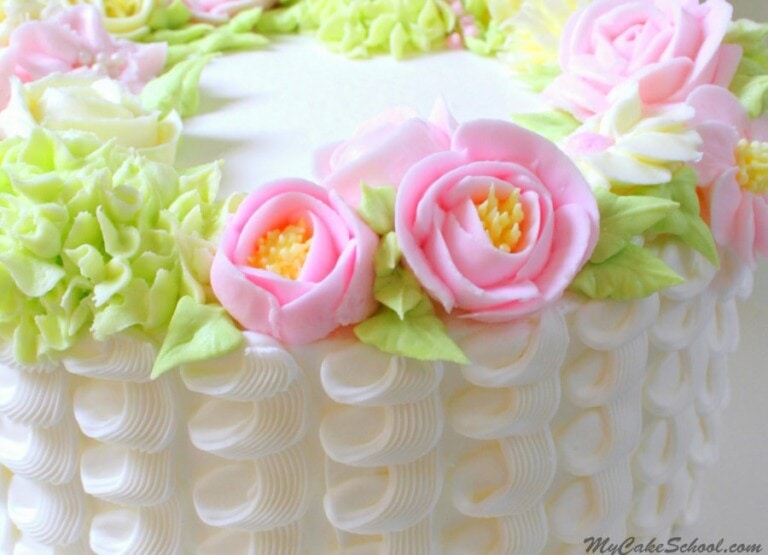 Learn how to make a gorgeous buttercream floral wreath cake in this MyCakeSchool.com cake video tutorial! MyCakeSchool.com online cake tutorials, videos, recipes, and more!
