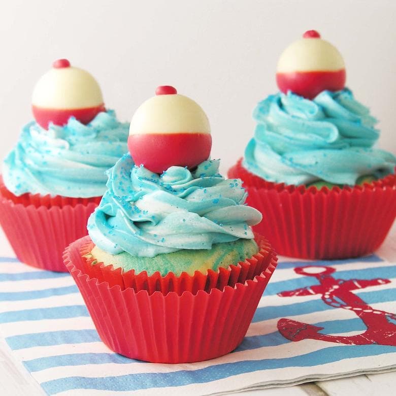 CUTE Fishing Bobber Cupcake Tutorial by EasyBaked.net as featured on MyCakeSchool.com's Father's Day Cake Roundup! 