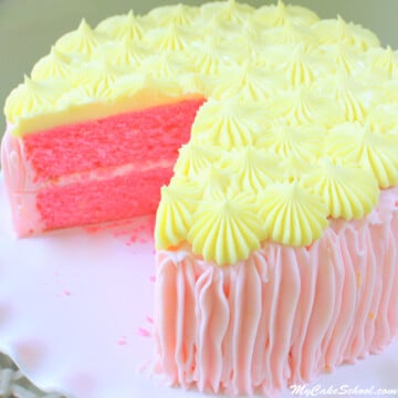 Pink Lemonade Cake on white pedestal.