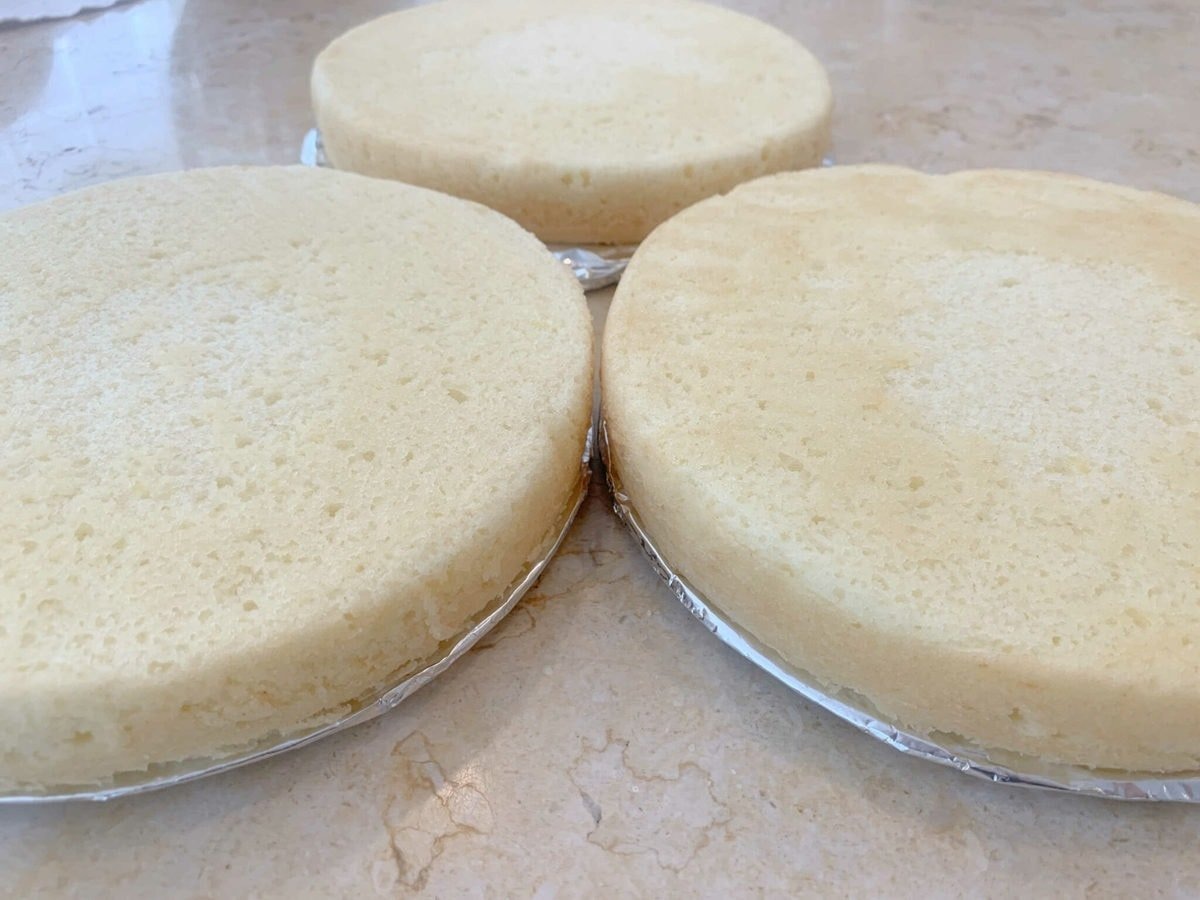 Three freshly baked cake layers.