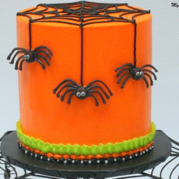 The Perfect Halloween Party Cake! In this free cake video, learn to create fun & creepy Chocolate Spiders! Tutorial by MyCakeSchool.com.