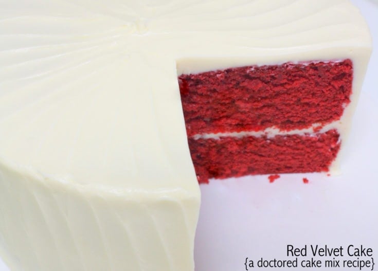 The BEST doctored cake mix Red Velvet Cake recipe! Super moist, delicious, and fantastic with Cream Cheese Frosting! MyCakeSchool.com.