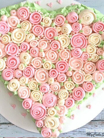 Romantic Buttercream Ribbon Roses Heart Cake Tutorial by My Cake School! The free version of this cake tutorial is available in our blog!